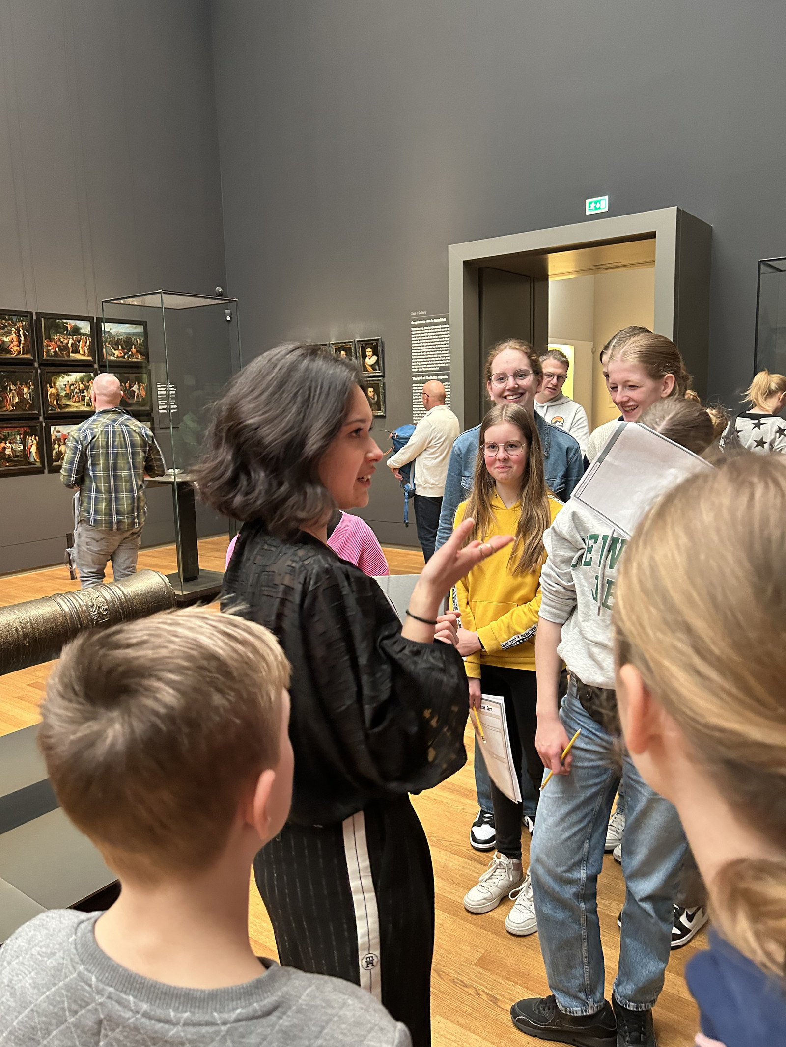 Teddy Damwijk guiding a museum tour